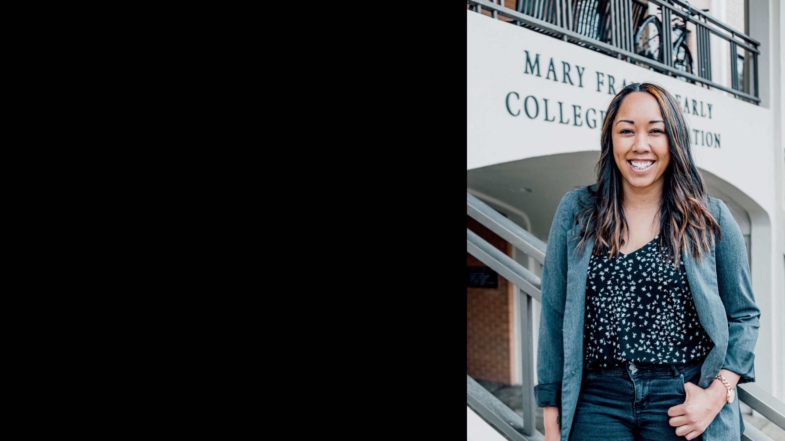 Shawntell Pace stands in front of the Mary Frances Early College of Education.